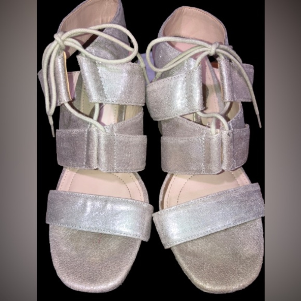 Nina “Alvira” Ghillie, silver metallic block heels. Sz 6